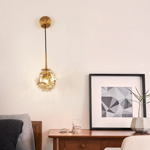 Modern simple glass wall-mounted bedside lamp in golden or silver finish.