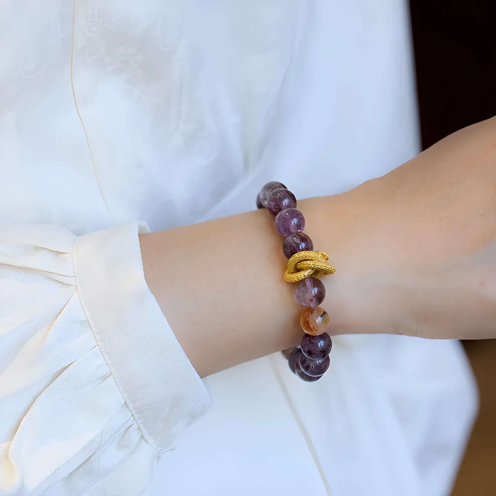 Purple ghost crystal bracelet with nine purple symbols and zodiac animal motifs measuring 10mm wide