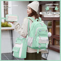 Waterproof school backpack for girls with spine protection in pink, blue, purple, red, black and fruit green colours