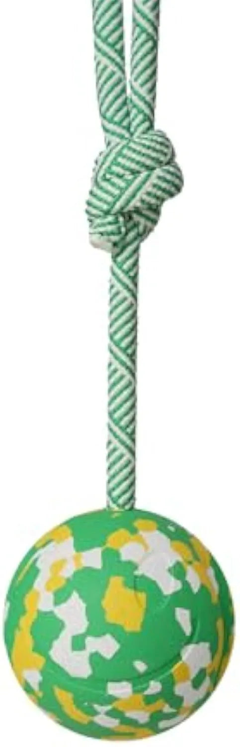 Natural rubber dog ball attached to a nylon rope for fetch and tug-of-war games.