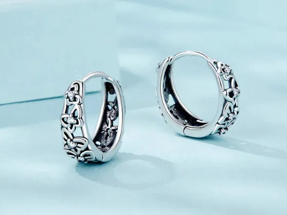 Sterling silver retro butterfly earrings with hollow design and zircon stones