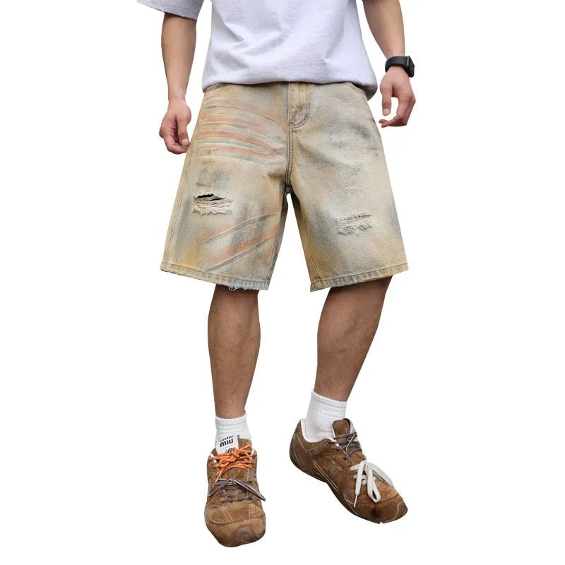 Men's light blue ripped denim shorts with washed old vintage styling