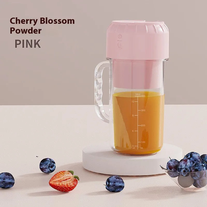 Compact USB-powered portable juicer in avocado green or cherry blossom pink colour.