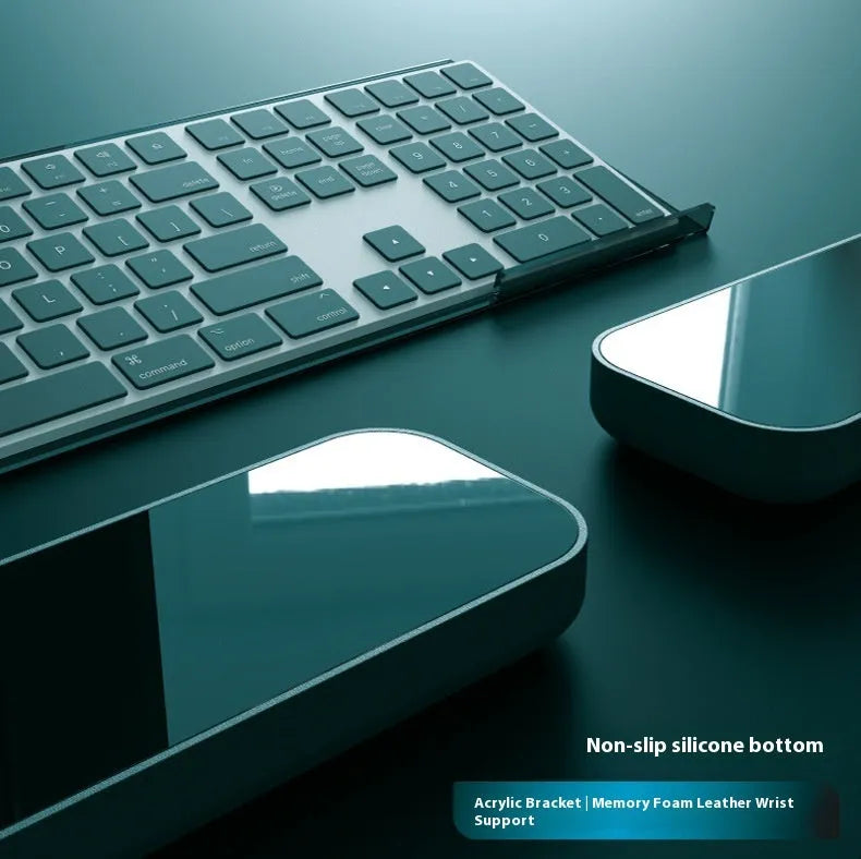 Double-sided keyboard and mouse pad with memory foam cushioning and wrist strap support