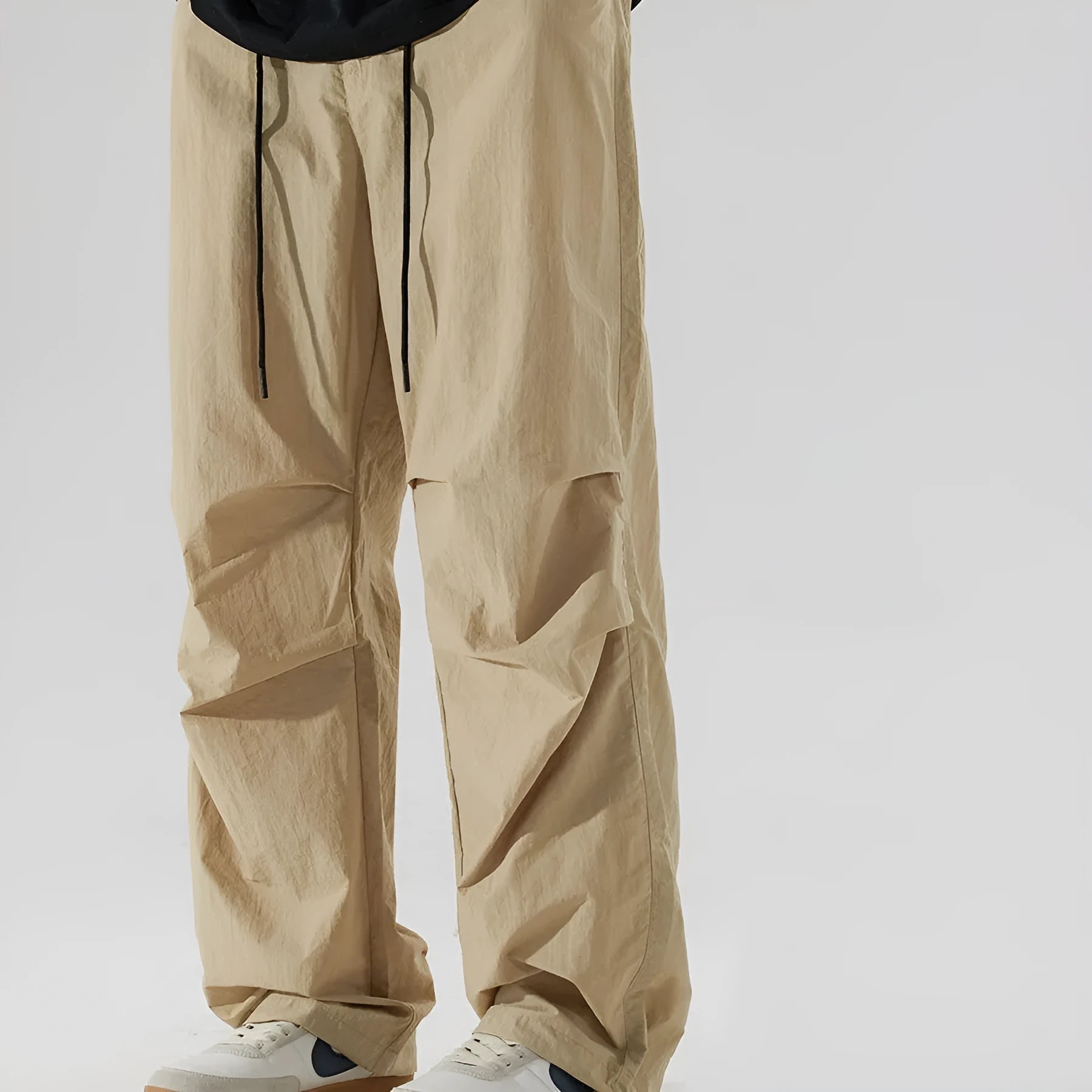 Men's thin ice silk nylon trousers in straight-leg cut showing colour options including black, army green, and apricot.