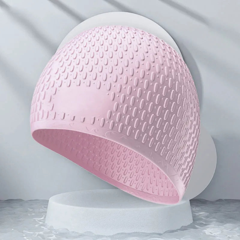 A solid colour silicone swimming cap for adults, shown in one of nine available colour options.
