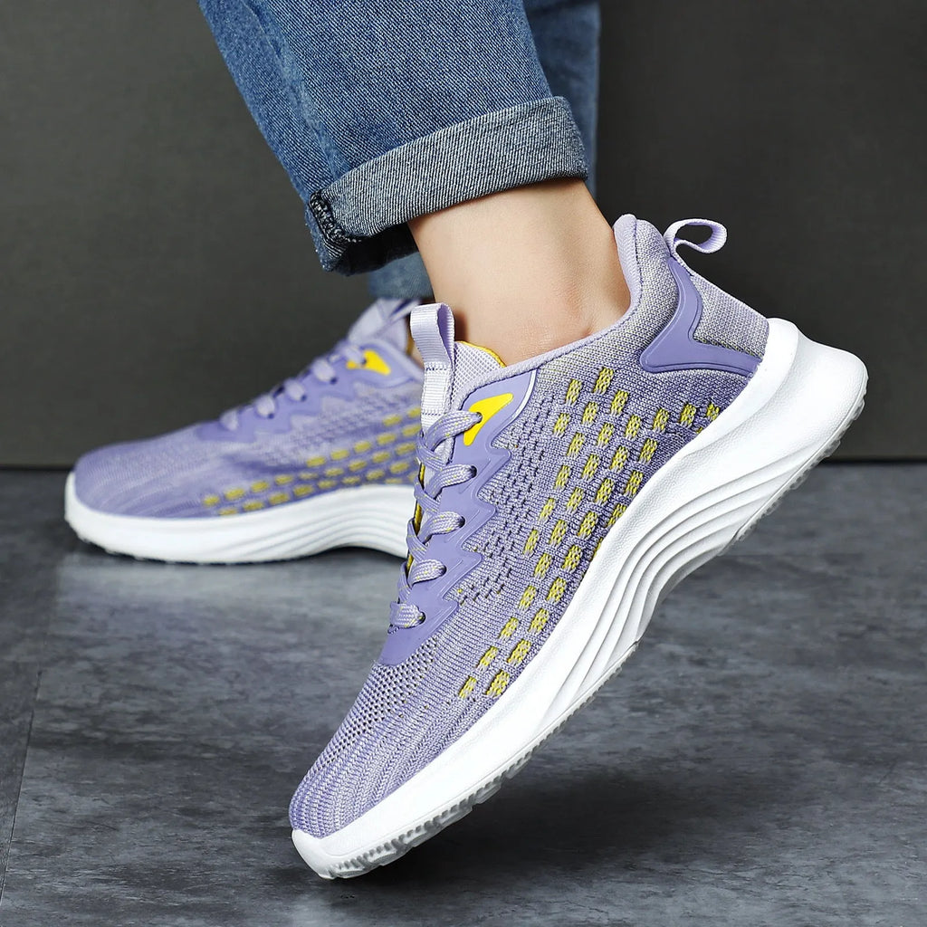 Lavender purple women's Flyknit running shoes with striped pattern and EVA sole.