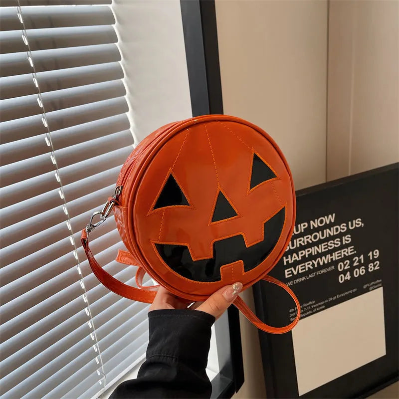 Small round pumpkin-shaped PU shoulder bag in orange for Halloween