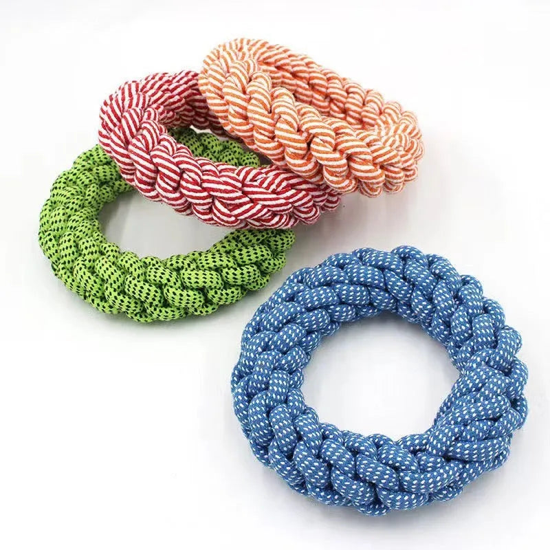 Close-up of a cotton braided ring knot toy for dogs, approximately 18cm diameter, made from cotton thread in a random colour