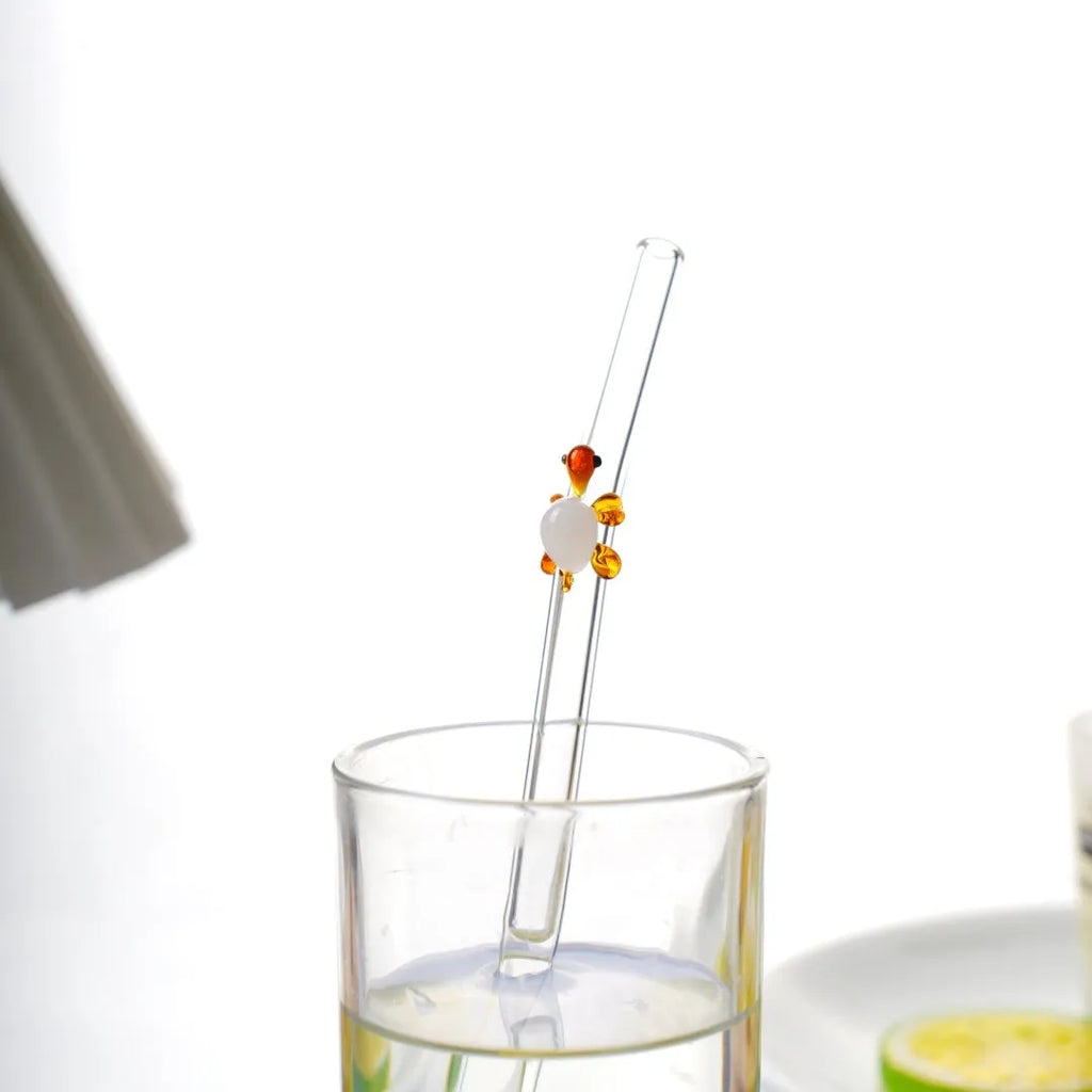 Set of four high borosilicate glass turtle elbow straws in pink green purple and yellow for children