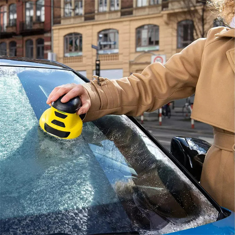 Yellow cordless electric snow scraper for car windows with USB charging cable