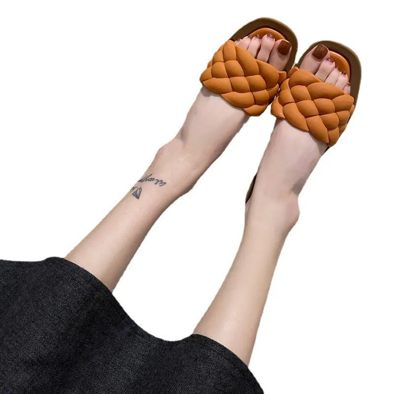 Women's PVC beach sandals with a thick non-slip sole in black, shown on a white background.