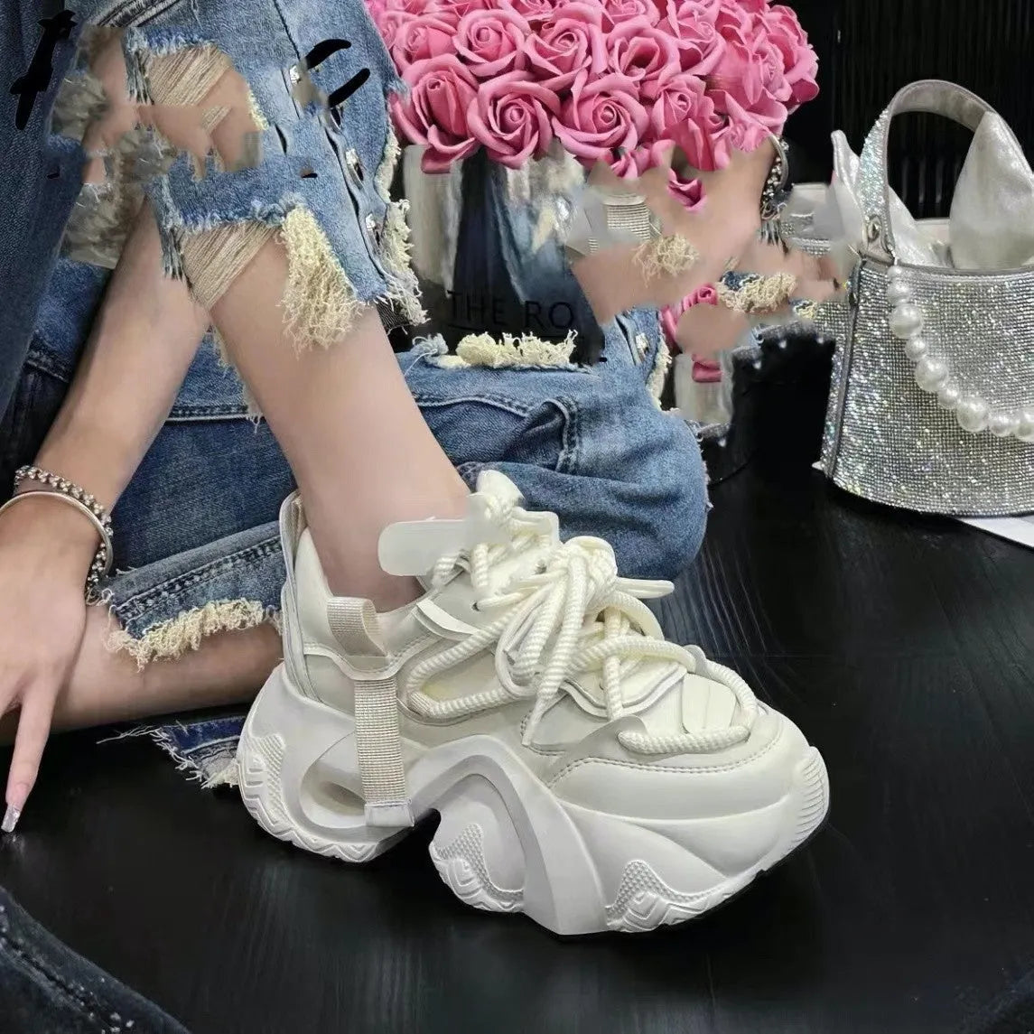 Women's casual sneakers with wedge heel and cross-strap design in synthetic leather