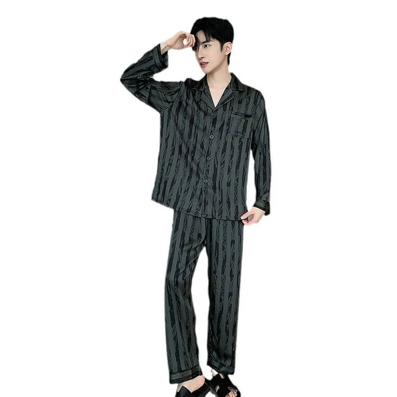Men's black striped ice silk pajama set with V-neck top and elastic trousers