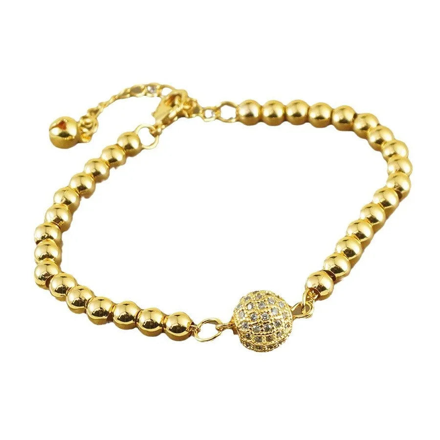 Arabic-style copper bracelet with a single zircon ball on a heart shape for women.