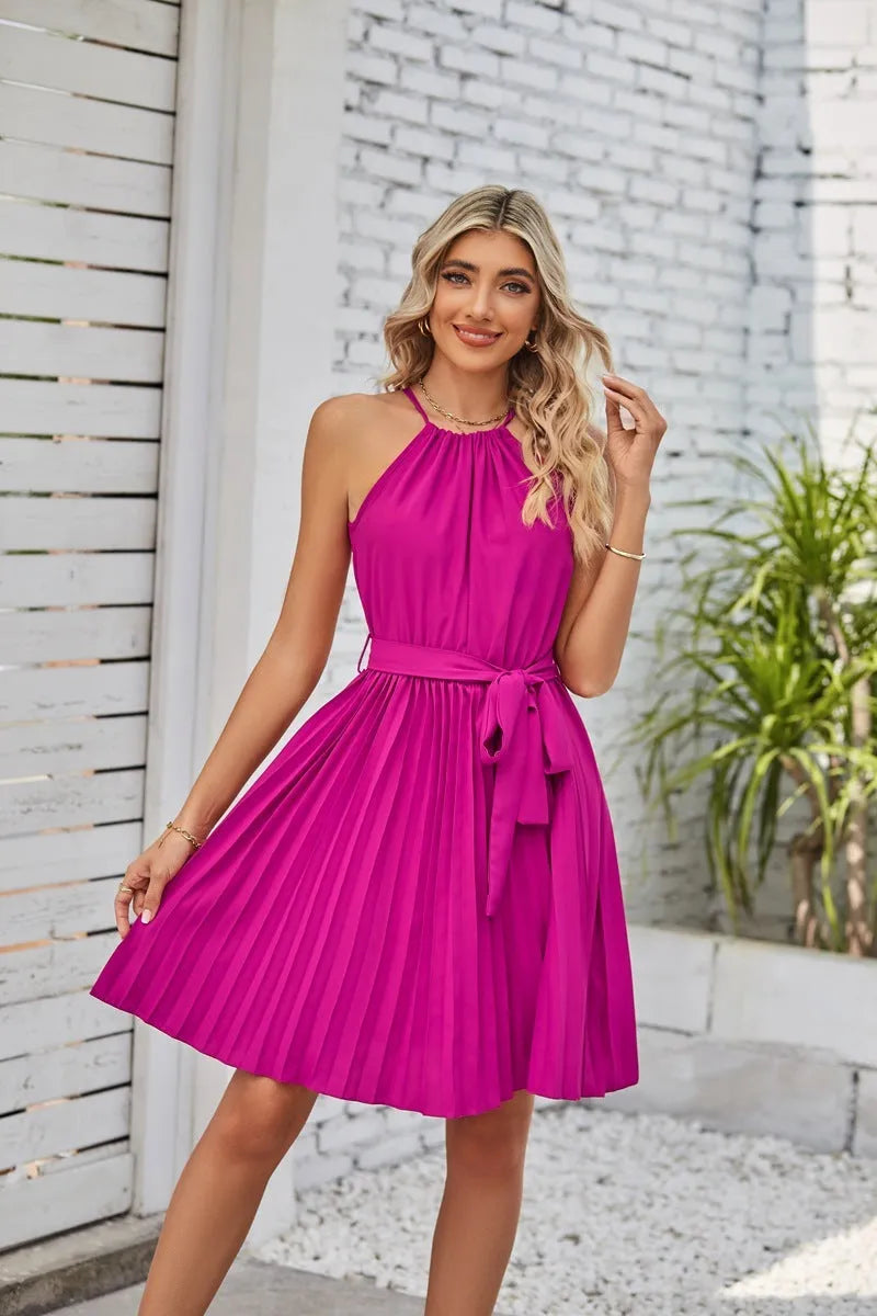 Women's black chiffon halter dress with pleated midi skirt and adjustable waist belt.