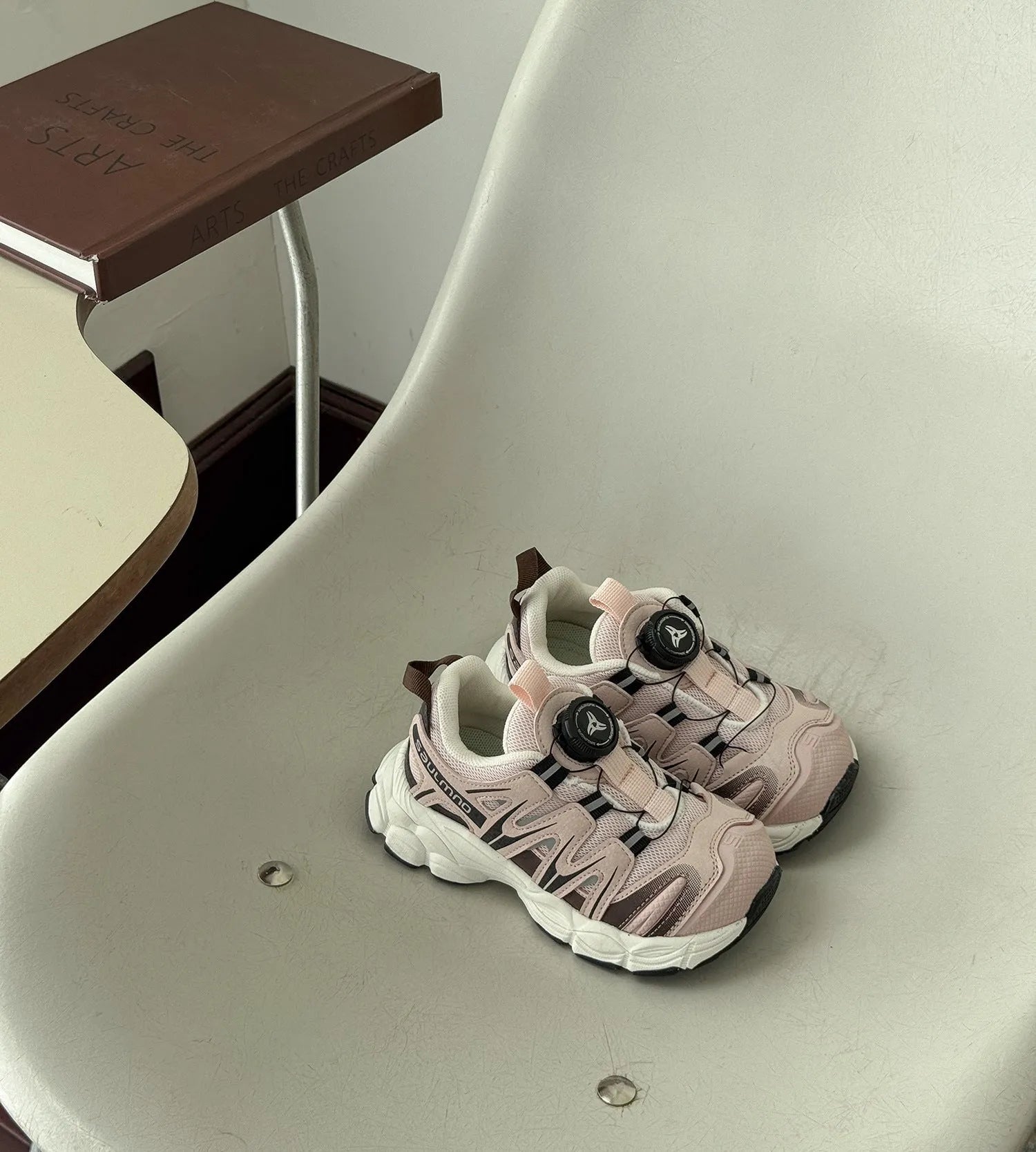 Lightweight beige casual shoes with a PU leather mesh upper and soft sole on a plain background.