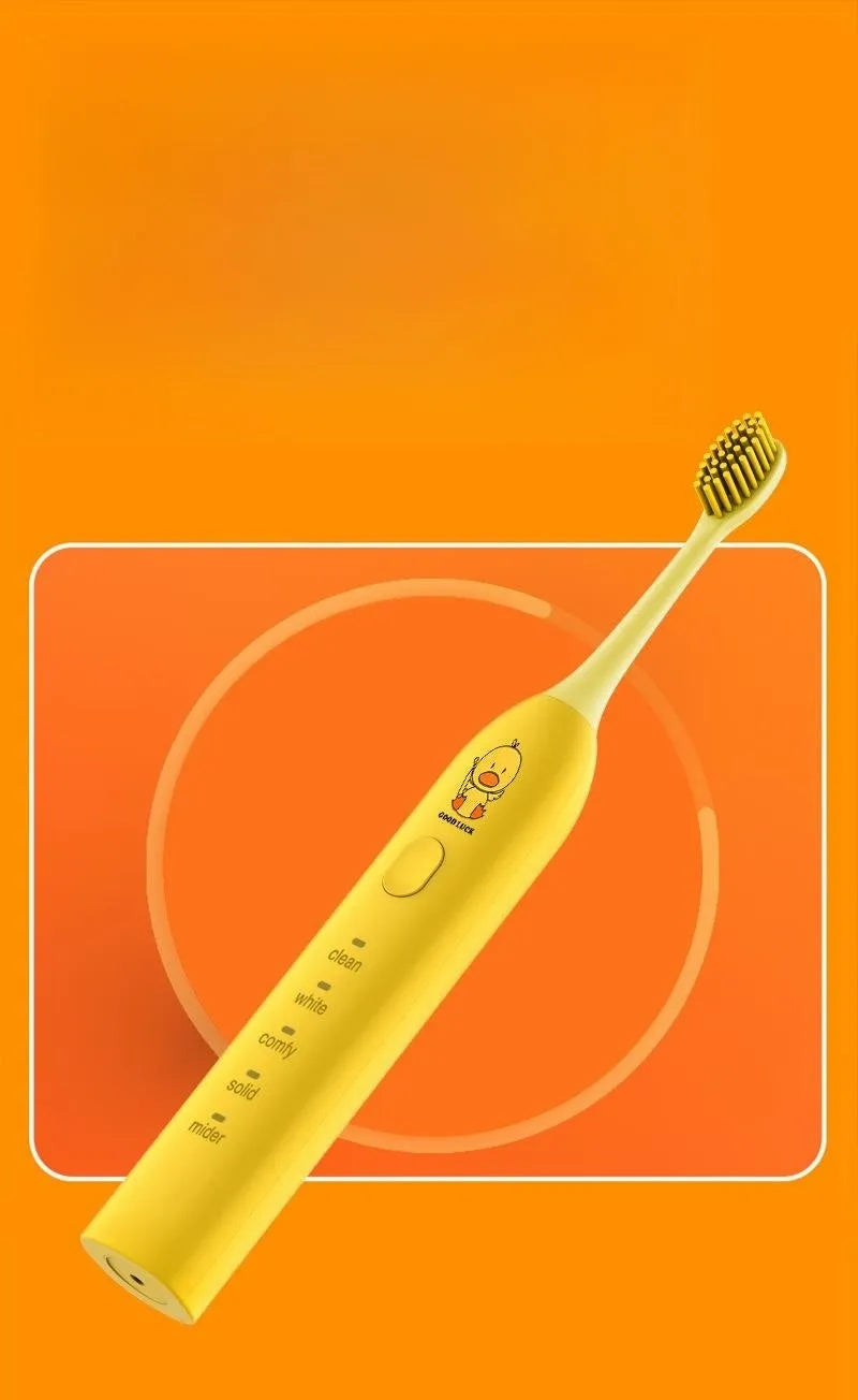 Yellow USB rechargeable electric toothbrush with small duck design and soft bristles