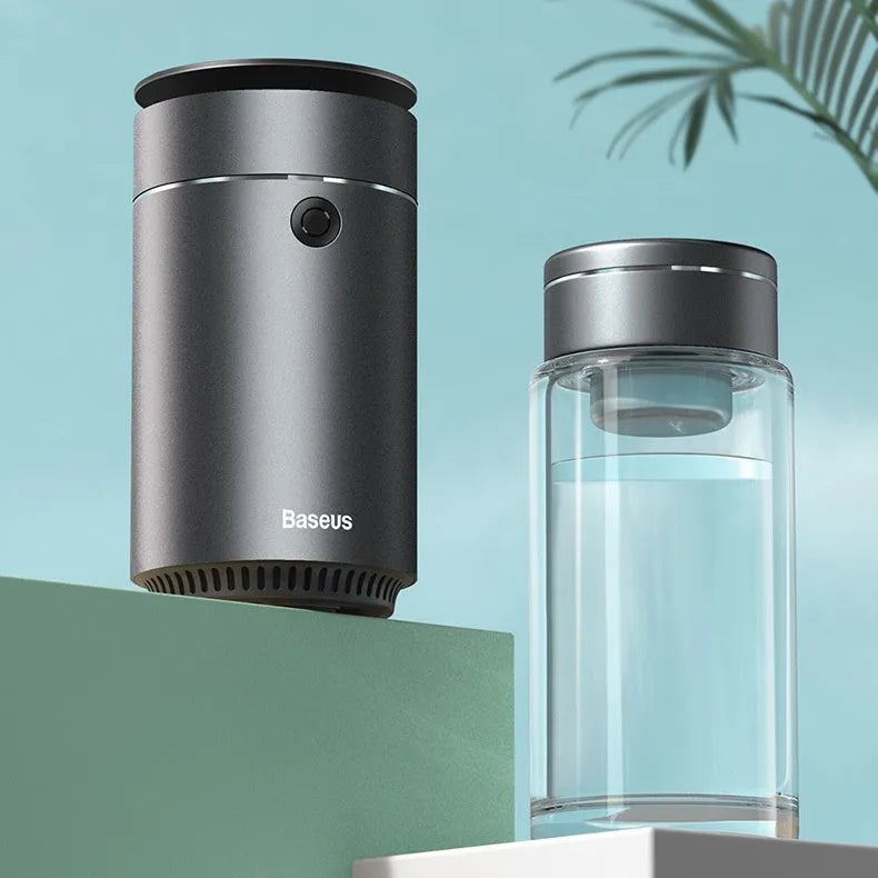 Dark gray column-shaped mini USB aromatherapy humidifier with 5W power and 0.5-1L reservoir for car and small room use