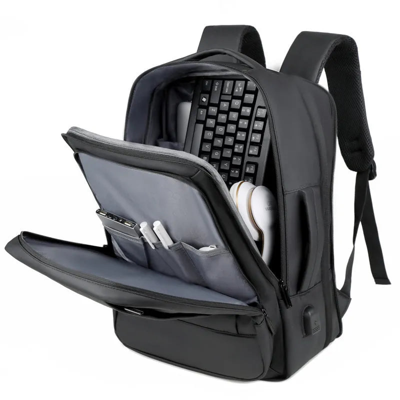 Black waterproof Oxford cloth backpack with curved shoulder straps showing business style and 20-35L capacity