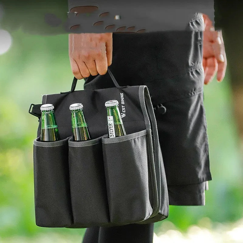 Black and orange double-sided bicycle drink storage bag mounted on a bike rack.