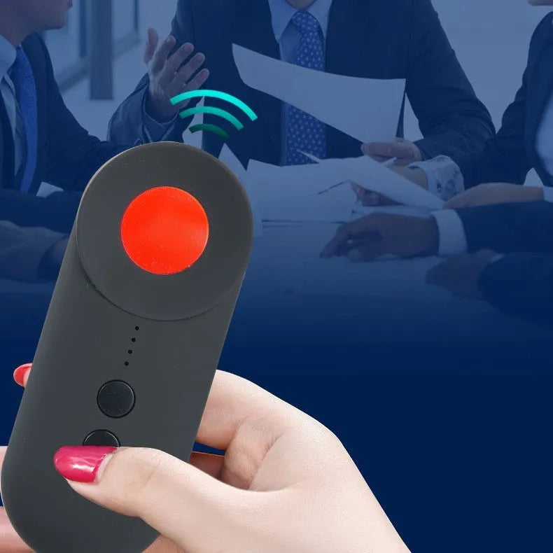 Black portable GPS and hidden camera signal detector showing compact size and Micro USB charging port.
