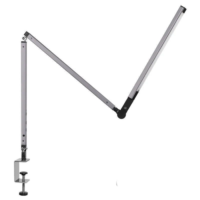 Black clip mount LED desk lamp with dimmer switch attached to study desk edge