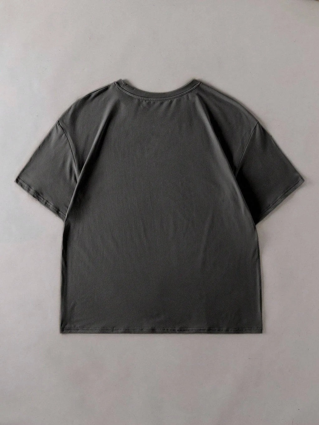 Man and woman modelling a simple loose-fit cotton summer t-shirt in various colours.