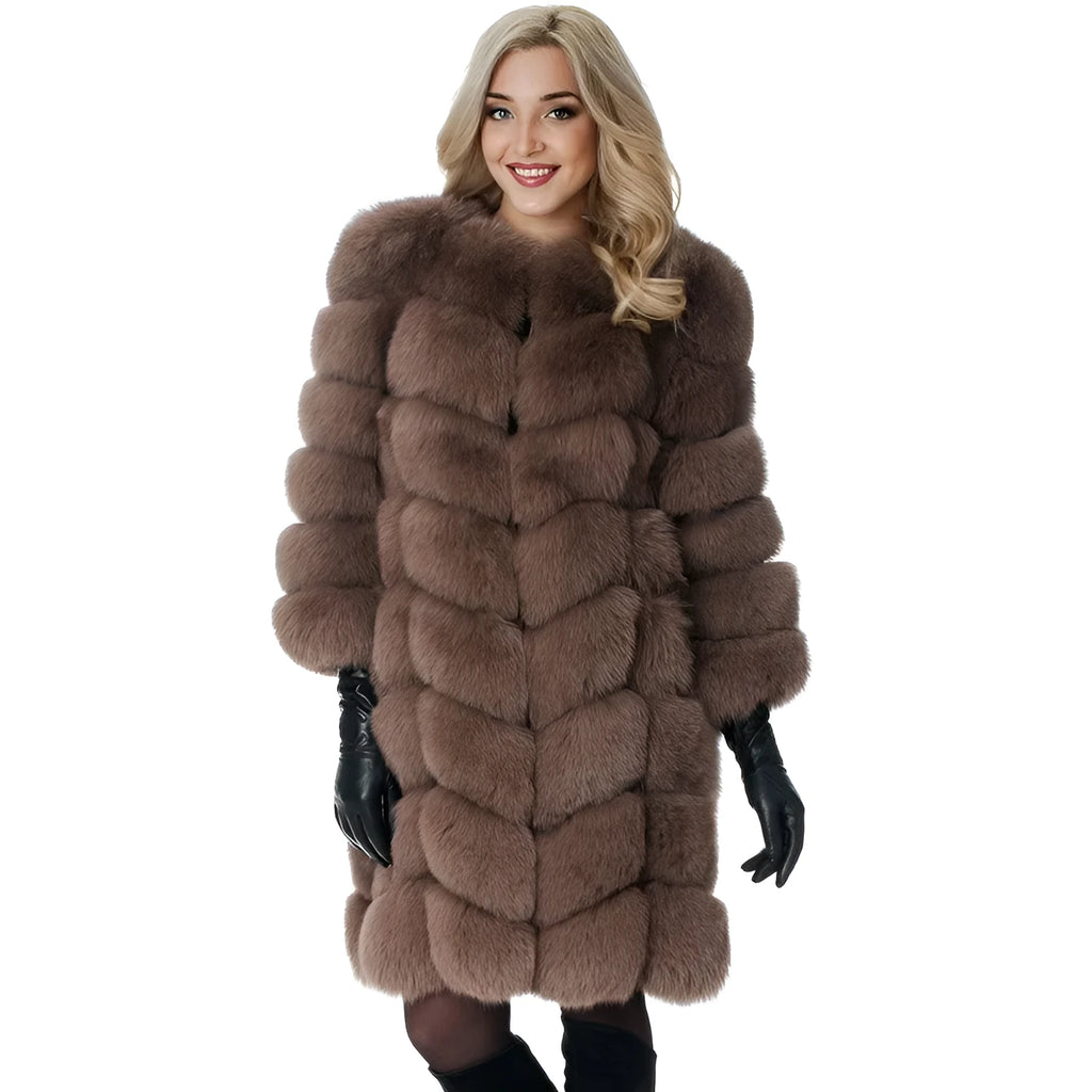 A woman wearing a long black artificial fur coat with regular sleeves.