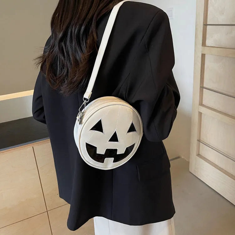 Small round pumpkin-shaped PU shoulder bag in orange for Halloween