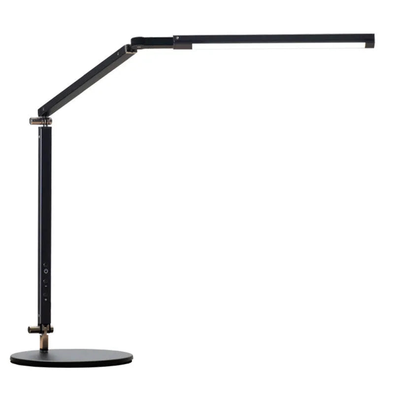 Black clip mount LED desk lamp with dimmer switch attached to study desk edge