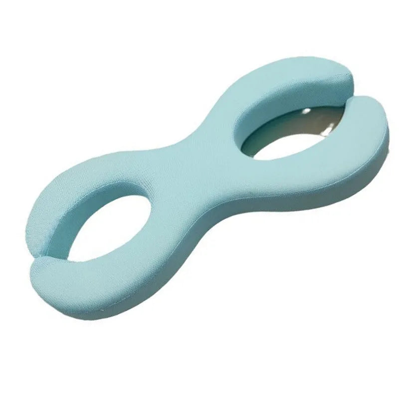 Blue cylindrical memory foam cervical pillow for neck support during sleep