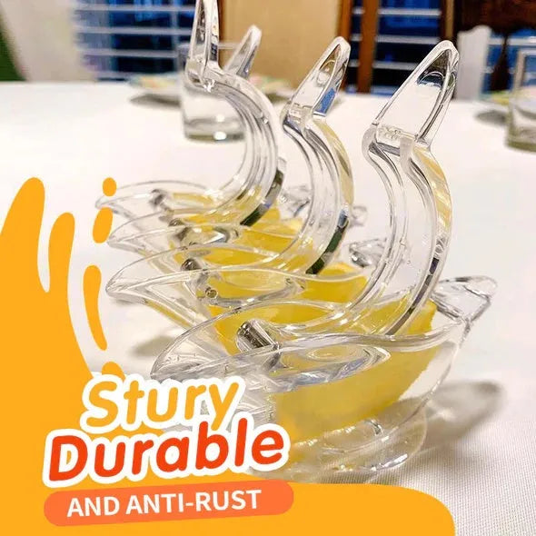 Transparent acrylic bird shaped manual lemon juicer with dimensions 12x3.5x5.1cm on a clean countertop