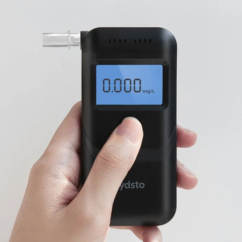 Black portable alcohol breath tester for personal drunk driving prevention checks