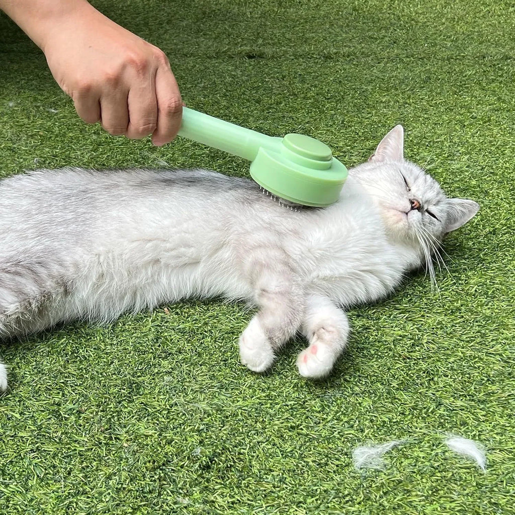 Green and yellow pet grooming brush with stainless steel teeth for deshedding cats and dogs