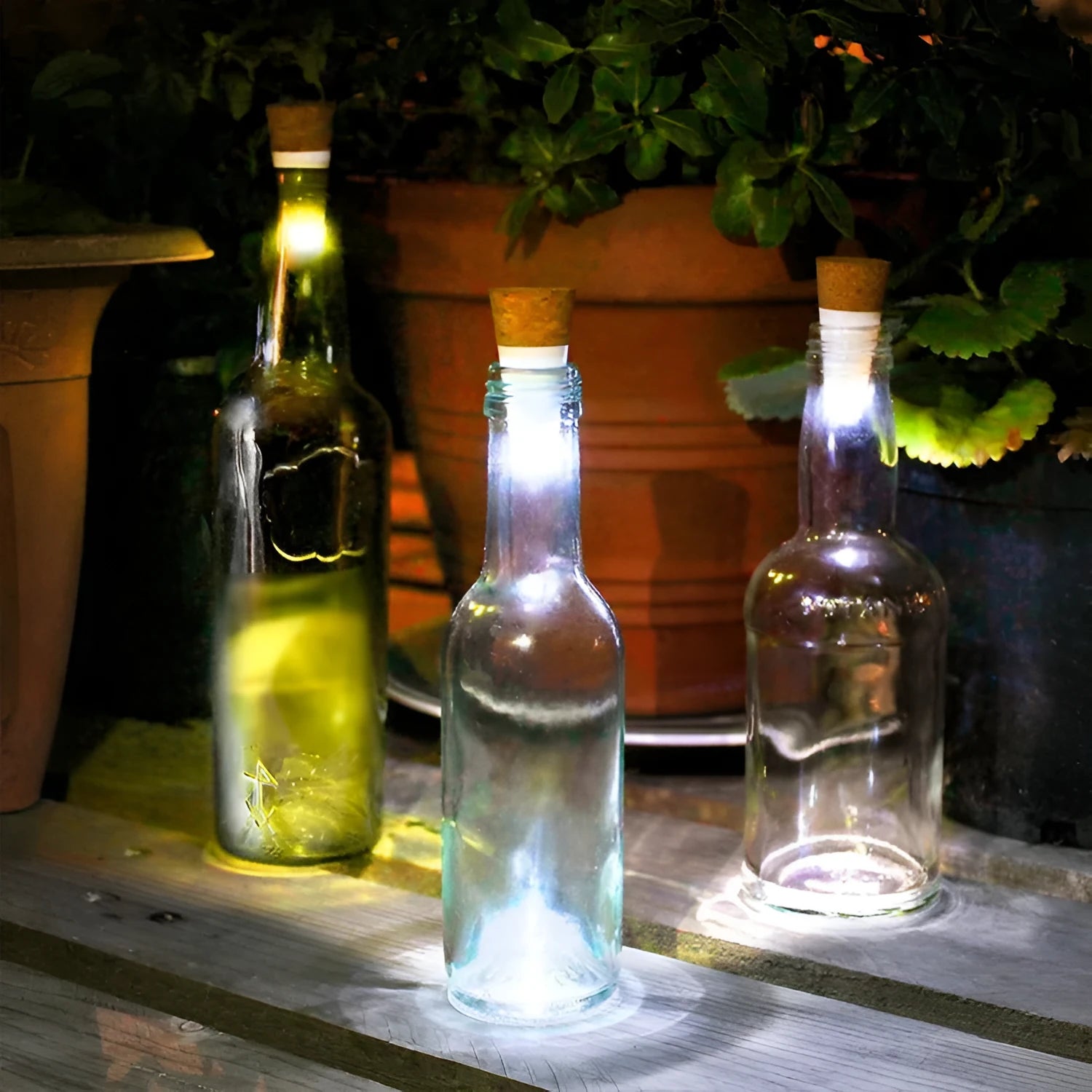 White plastic rechargeable LED bottle cap light with 15 small LED beads visible.