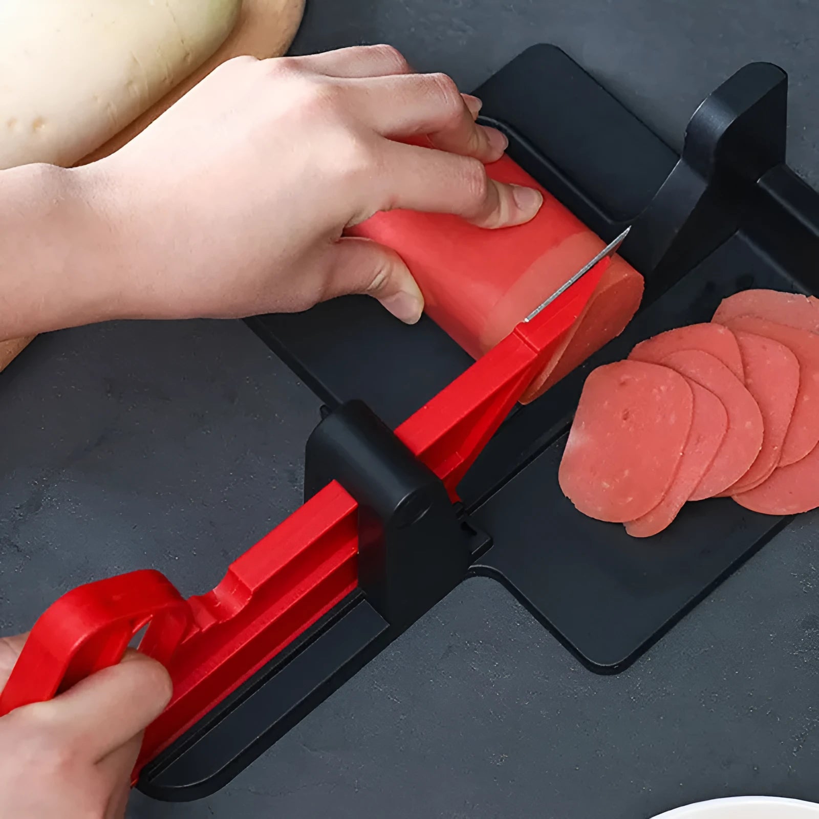 Green and red vegetable cutter with stainless steel blades for cutting carrots and potatoes