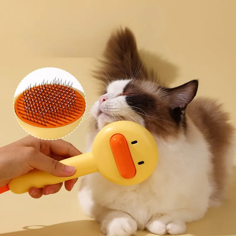 Small yellow duck comb brush for pet hair removal with open-section needle design
