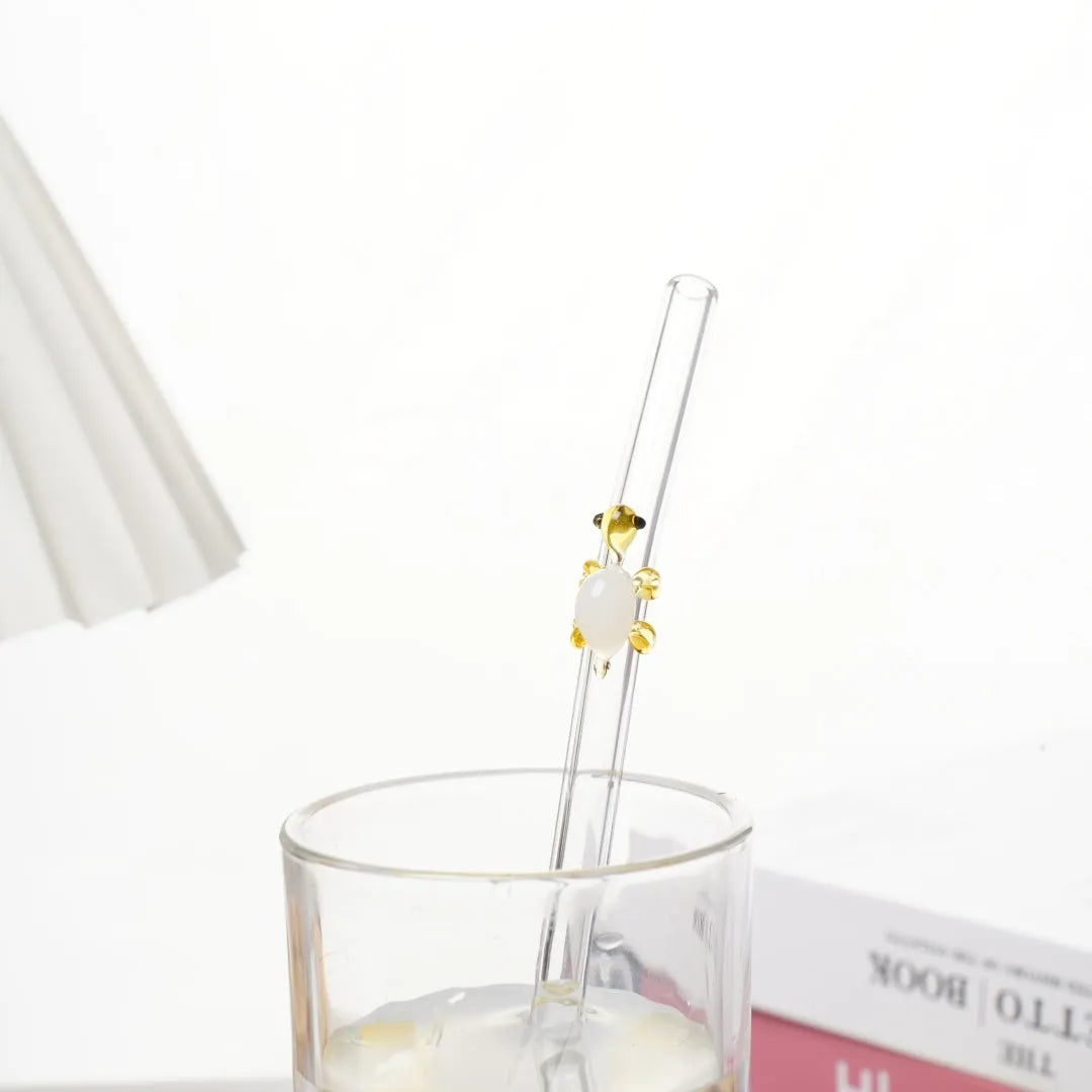 Set of four high borosilicate glass turtle elbow straws in pink green purple and yellow for children
