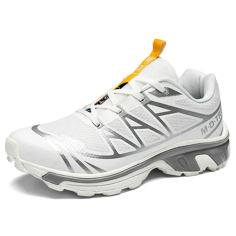 Low-top outdoor hiking shoes in artificial leather with mesh lining and rubber sole.