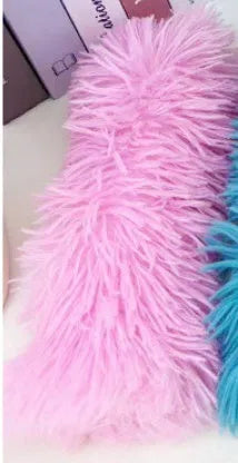 Soft plush cat toy pillow in blue, green, pink, and white colours measuring 27cm by 10cm