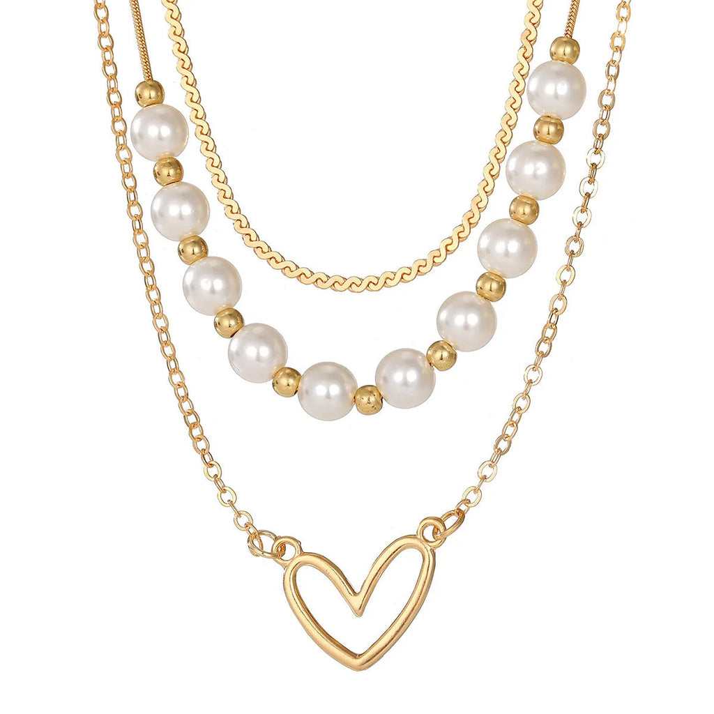 Vintage gold necklace with heart pendant on pearl chain, adjustable length 41-50cm