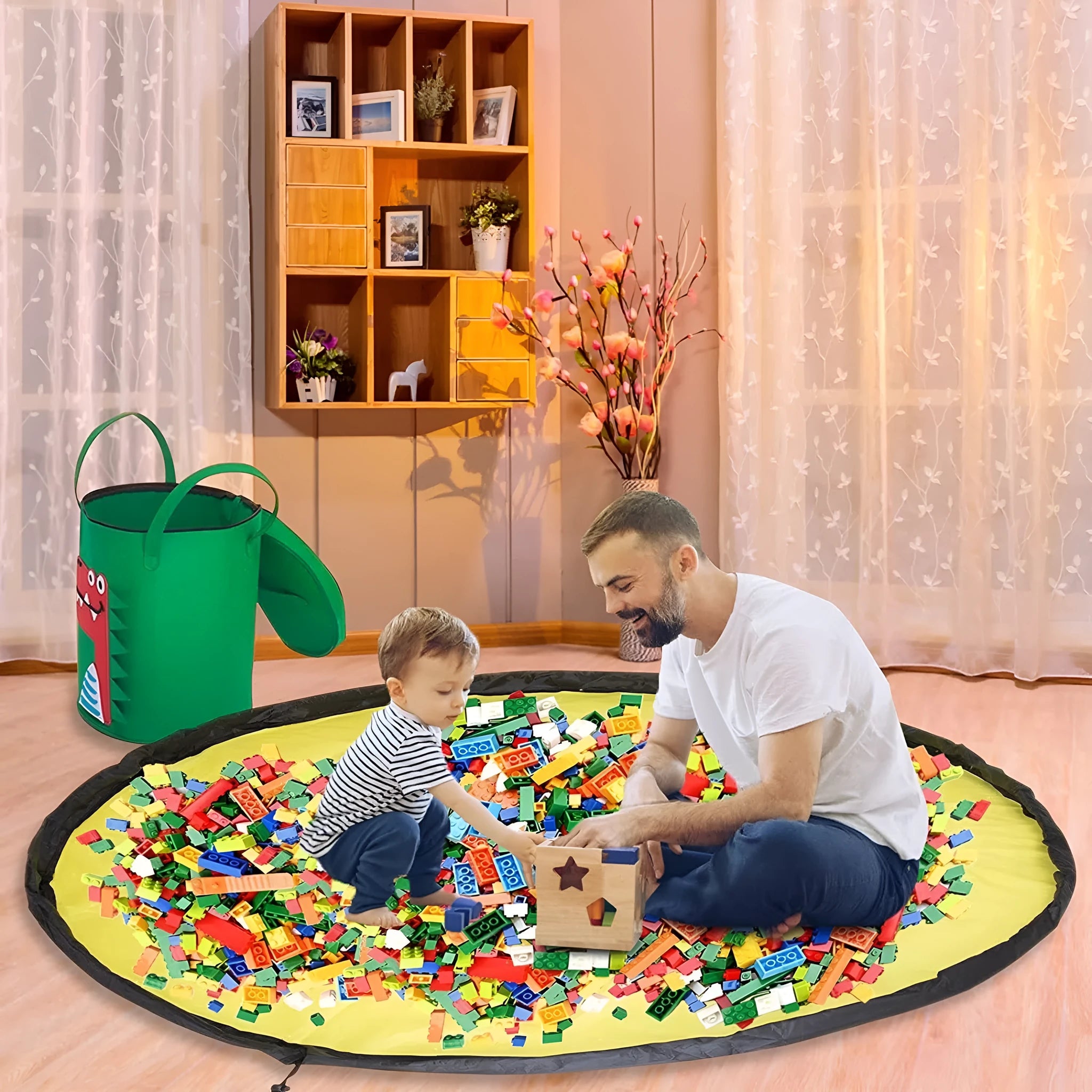 Green felt storage bag with pull rope that converts to toy play mat