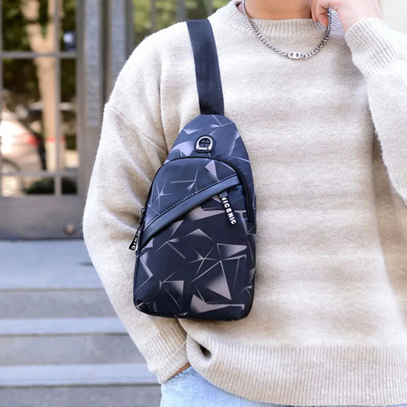 Blue Oxford cloth sling bag with a crossbody strap, earphone hole, and zipper pocket.