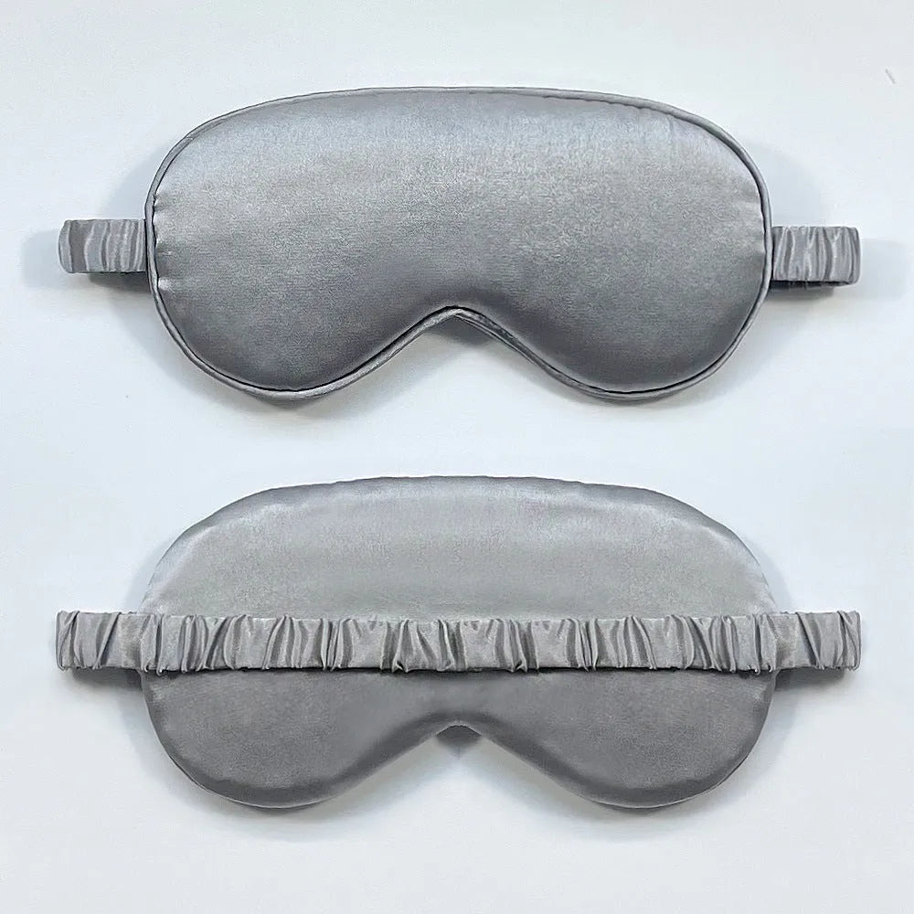 Double-sided rayon elastic satin sleep mask shown in multiple colour options including black, sky blue, and wine red.