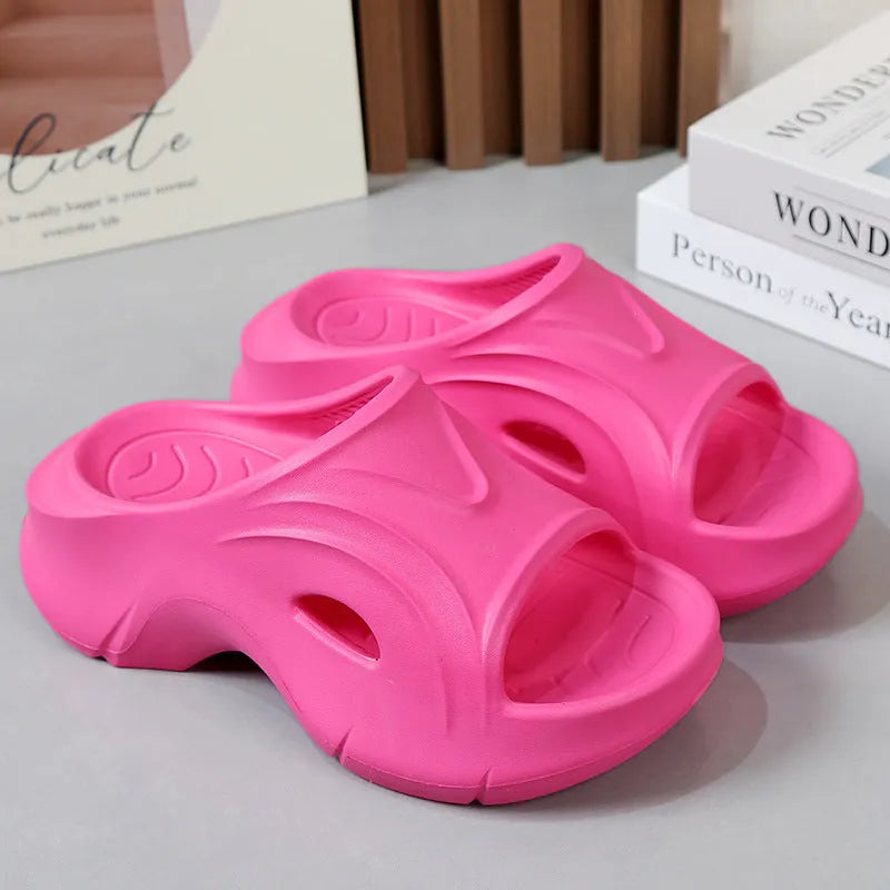 Women's thick-soled EVA slippers in white, black, or rose red with round toe design