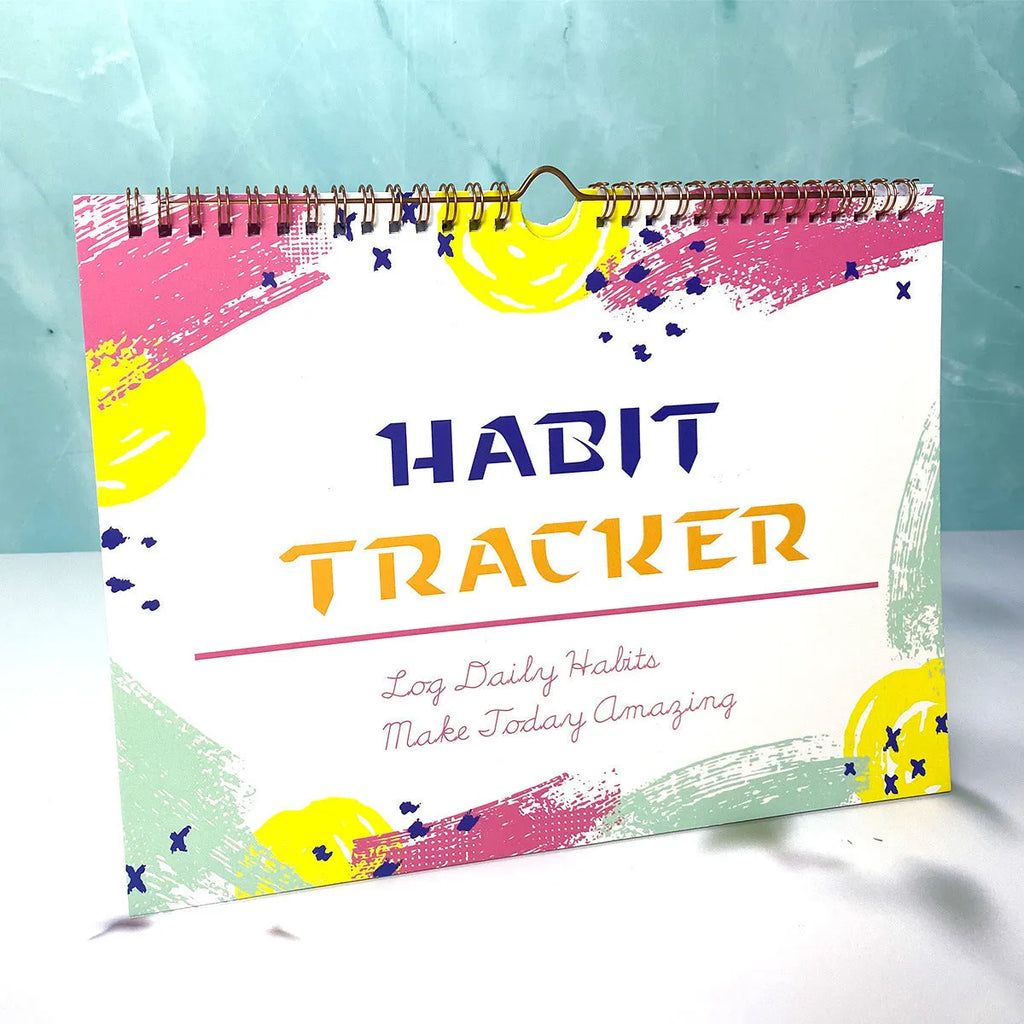 Habit tracking journal with 12 pages measuring 21cm by 28cm in four colour options