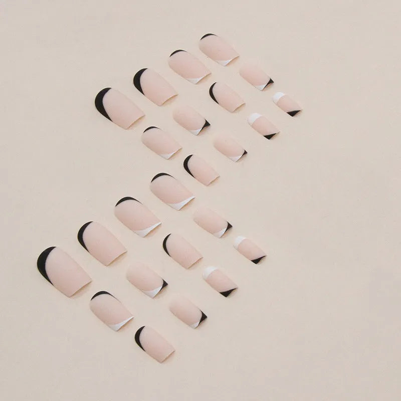 Black and white frosted artificial nails with French manicure design
