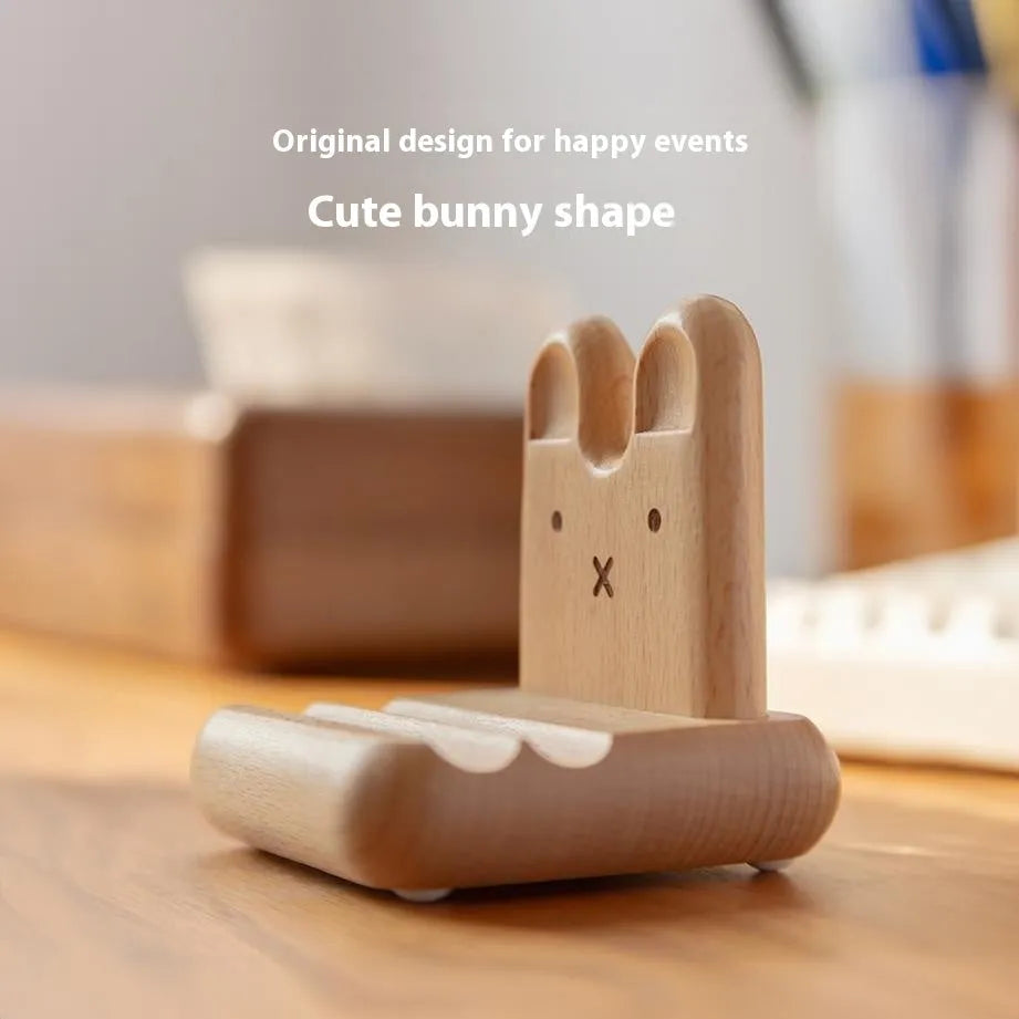 Creative Bunny Tatami Wooden Mobile Phone Stand with bunny design on a wooden desk