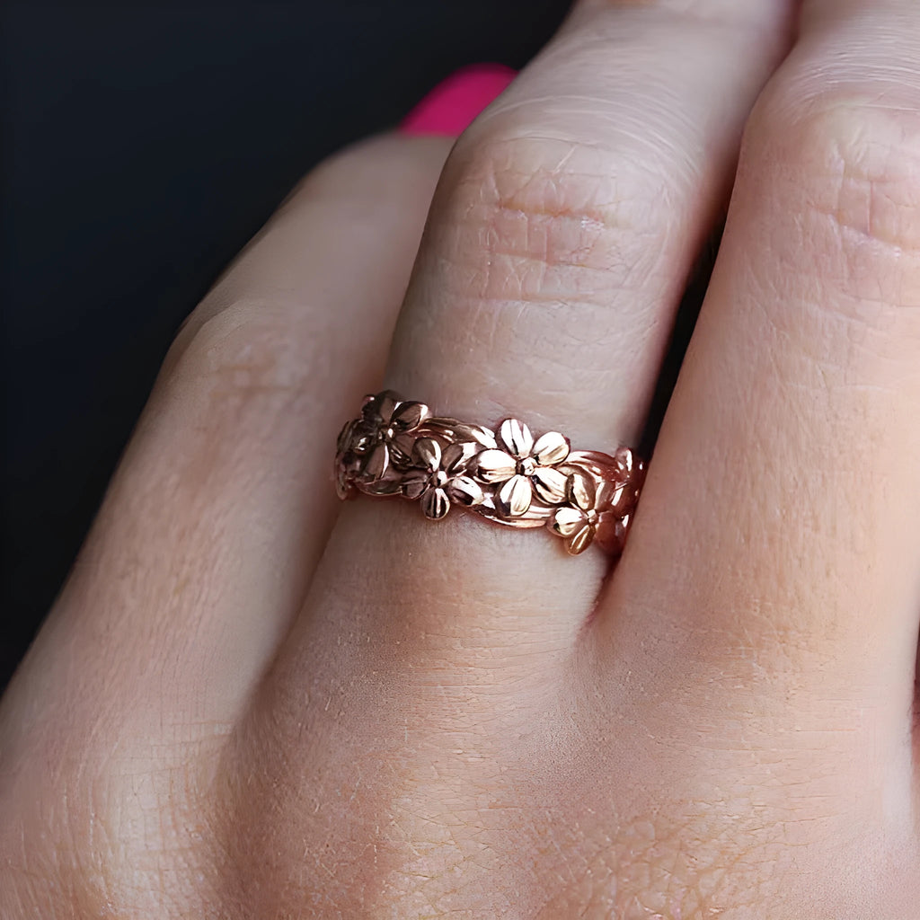 Women's alloy plum ring ornament with diamond treatment in rose gold colour, available in multiple sizes